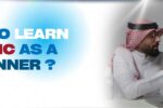 Image for a blog on learning Arabic as a beginner, featuring a man in traditional Middle Eastern attire and a woman interacting positively over a laptop. The text 'How to Learn Arabic as a Beginner?' is displayed in bold blue and red fonts, with the Zabeel International logo and website URL (https://zabeel-international.com/) at the bottom left.