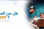 مجموعة من الشباب ينظرون بتركيز إلى شاشة كمبيوتر محمول، ويظهر على وجوههم الفضول والاستغراب، مع خلفية تحتوي على مخططات هندسية رقمية. يظهر النص بجانبهم: "هل من الصعب تعلم Revit؟" بخط عريض باللونين الأزرق والبرتقالي. شعار معهد زعبيل في الزاوية العلوية اليسرى، ورابط الموقع الإلكتروني https://zabeel-international.com/ في الأسفل.