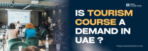 A classroom setting with students seated and a woman presenting a slideshow titled "What is a Role Profile?" on a projector screen. On the right, bold text reads: “IS TOURISM COURSE A DEMAND IN UAE?” with “TOURISM COURSE” highlighted in yellow. The Zabeel Institute logo and website link (https://zabeel-international.com/) appear on the top and bottom right respectively.